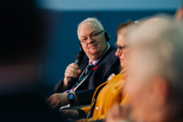 MP Luc Thériault looks to the left as he listens to his fellow speakers on the plenary