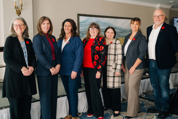 Speakers from the military and veteran caregiving panel with CCCE's Liv Mendelsohn, all with red poppies pinned on their lapels.